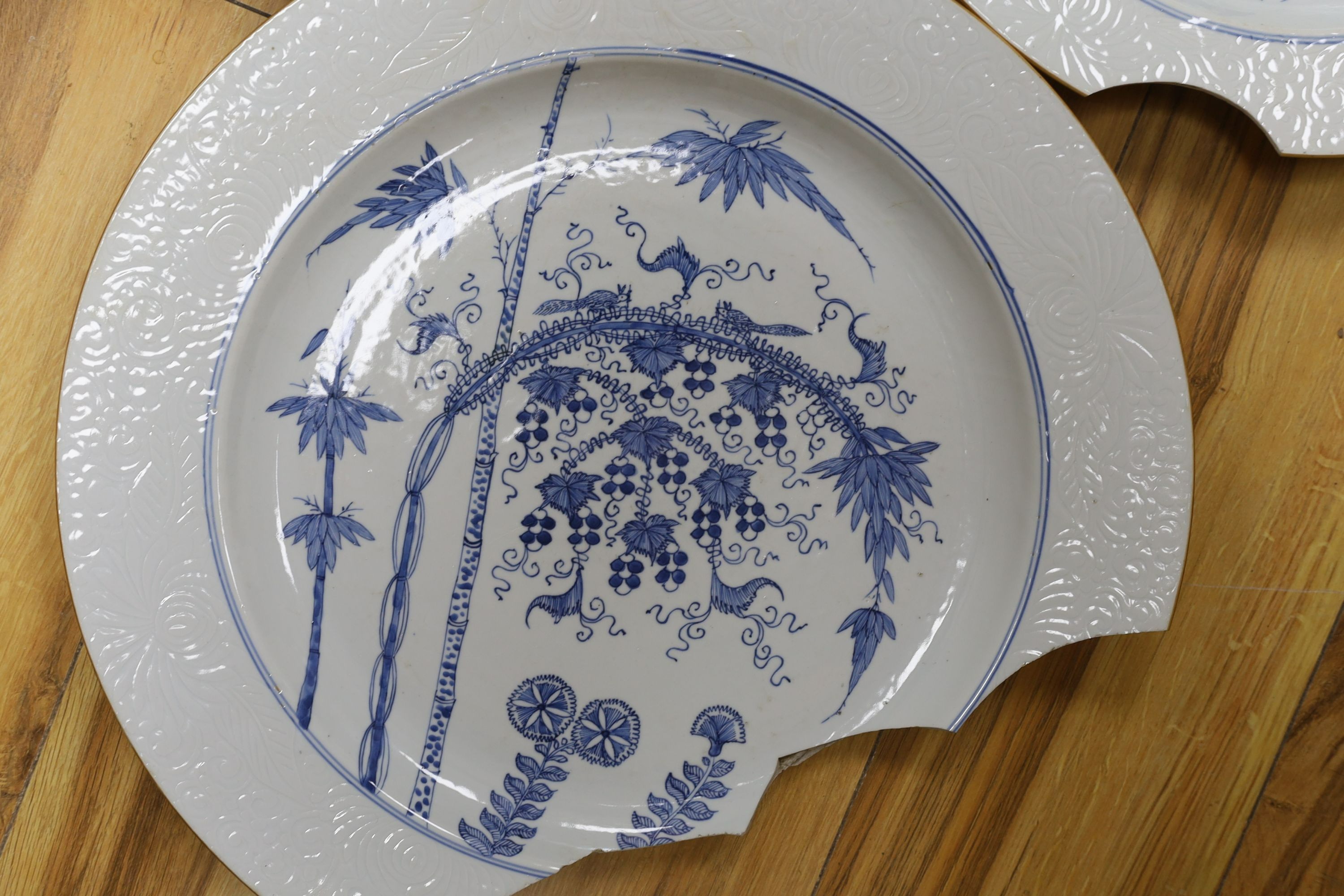 A group of three 18th century Chinese blue and white ‘squirrel, bamboo and vine’ chargers (a.f) 42cm
